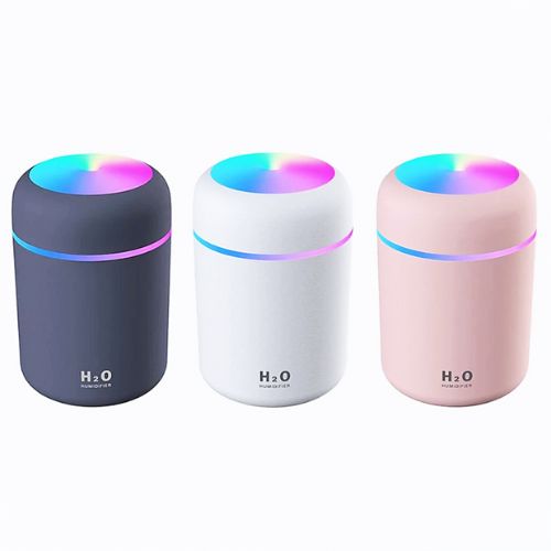 Mini air humidifier on bedside table