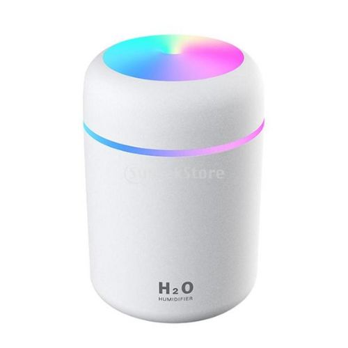 White humidifier with colorful LED light on a white background