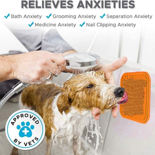 Calm dog using feeder during grooming

