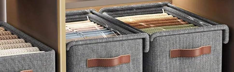 Gray storage bins with brown handles on a wooden surface