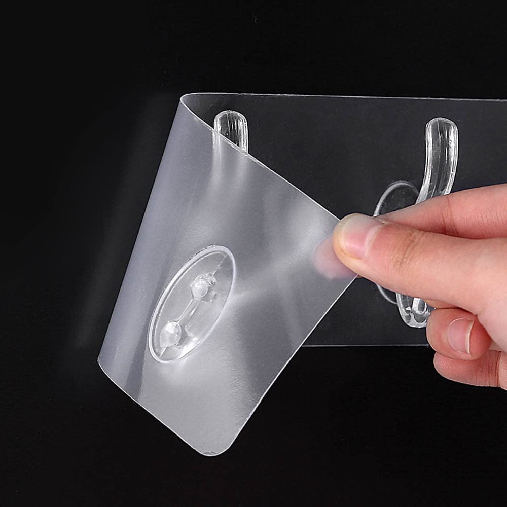 Transparent heavy-duty adhesive wall hook with 6 rotating hangers for kitchen, bathroom, and multipurpose use – no drilling required.

