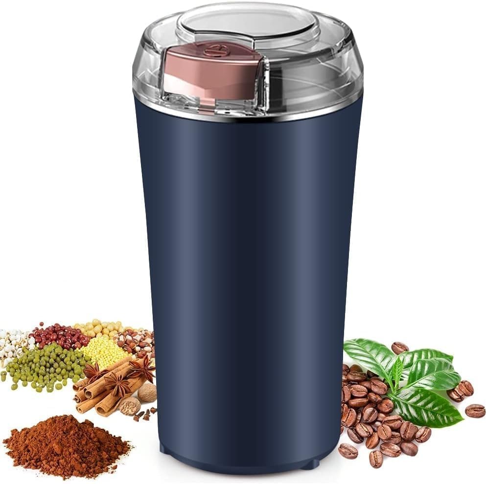 Navy blue spice grinder with spices and coffee beans on a white background