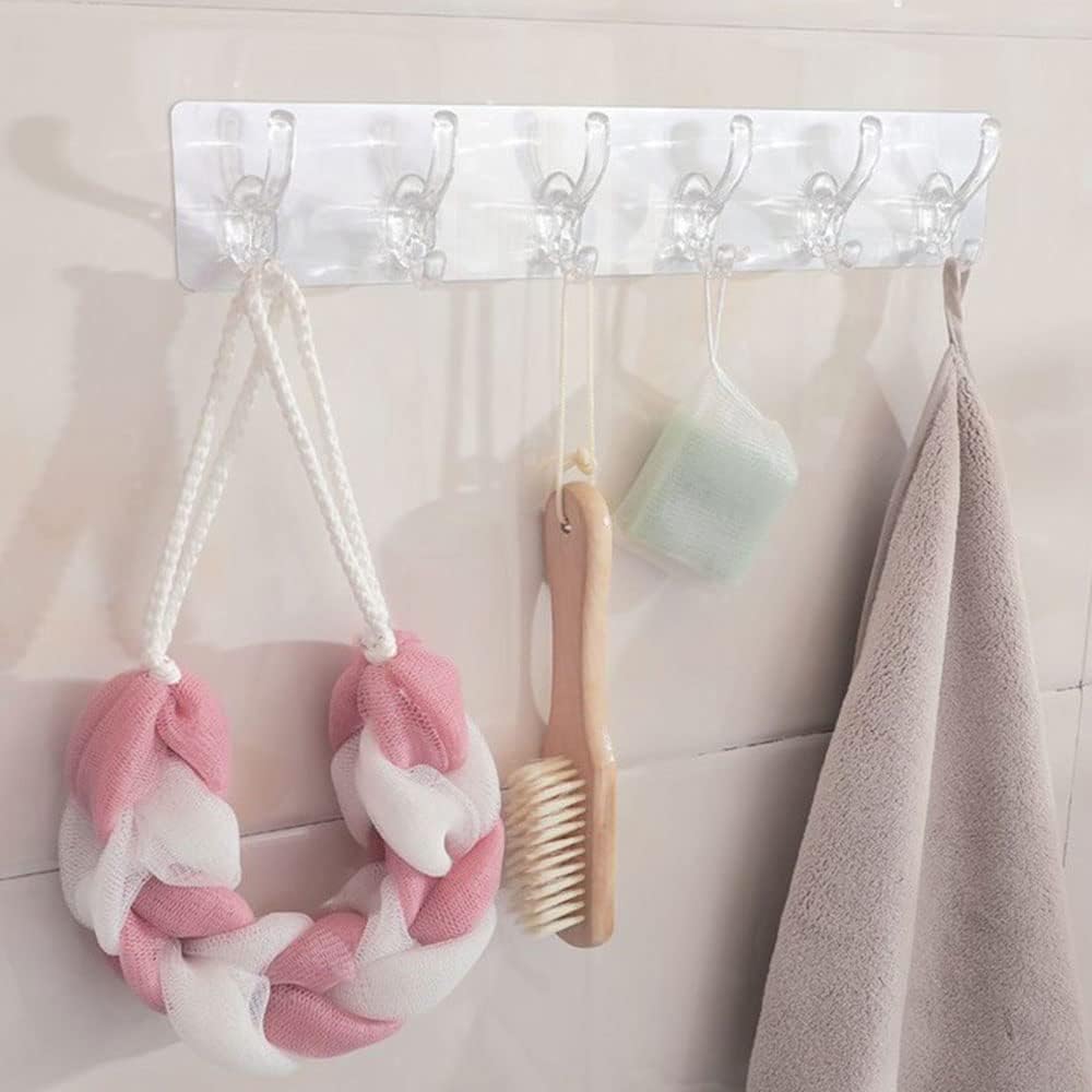 Transparent heavy-duty adhesive wall hook with 6 rotating hangers for kitchen, bathroom, and multipurpose use – no drilling required.

