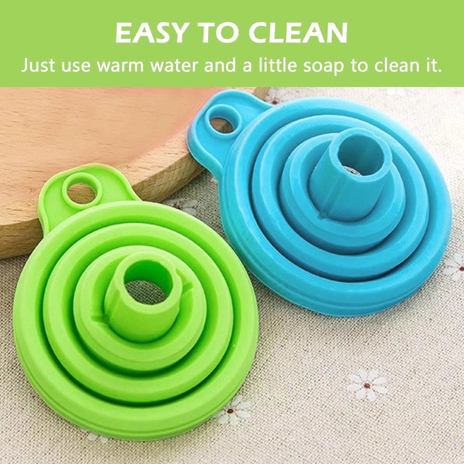 Collapsible silicone bowls in green and blue on a textured surface with cleaning instructions.