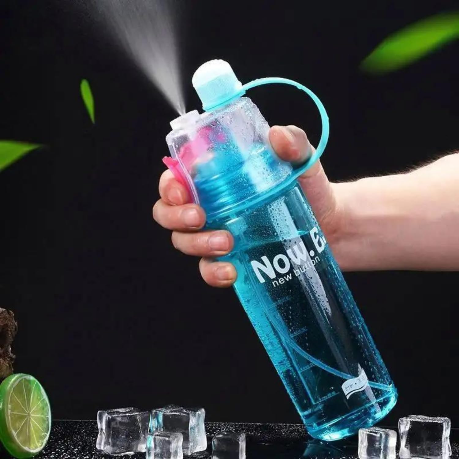 Blue spray bottle held by a hand with ice cubes and a lime in the background